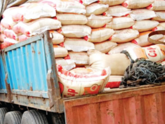 Lagosians Throw Stones At Customs Officers After Seizure Of Bags Of Rice